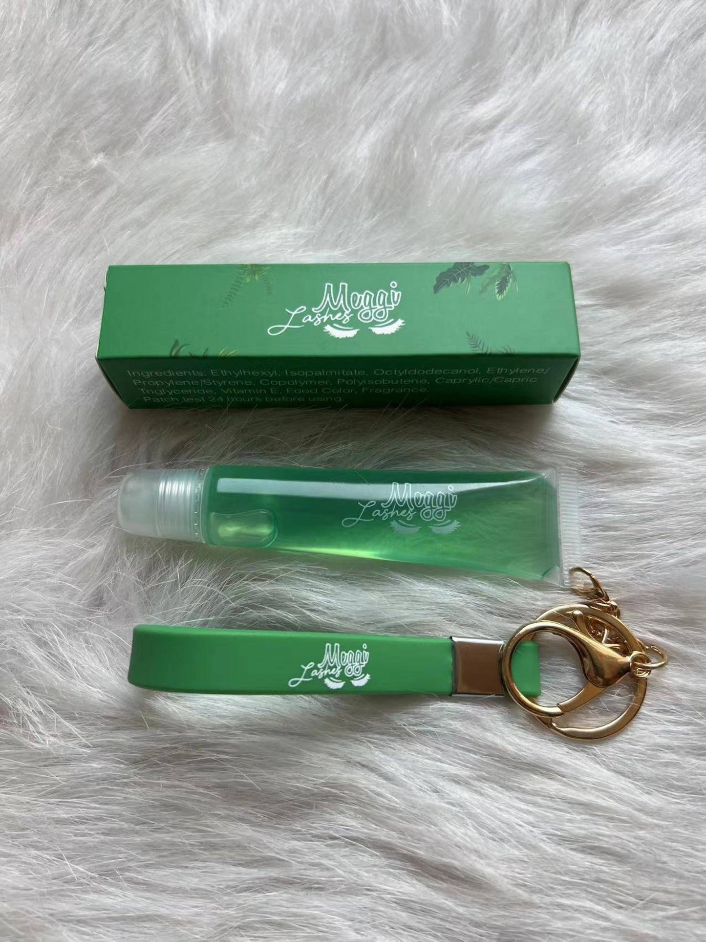 Green lipgloss keychain (Apple)